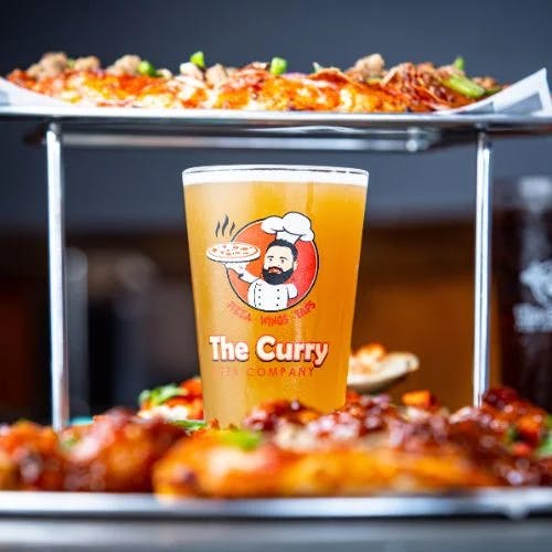 Clickable image showing A chilled glass of Curry Pizza's in house ornge juice. Should open an Instagram external link to the source image.