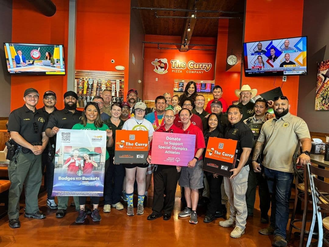 Clickable image showing The curry Pizza company spreading awareness about donating to support special olympic atheletes. Should open an Instagram external link to the source image.